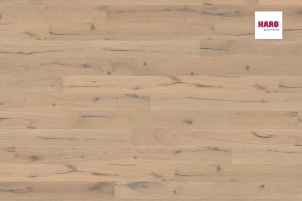 Light wood flooring with natural patterns.